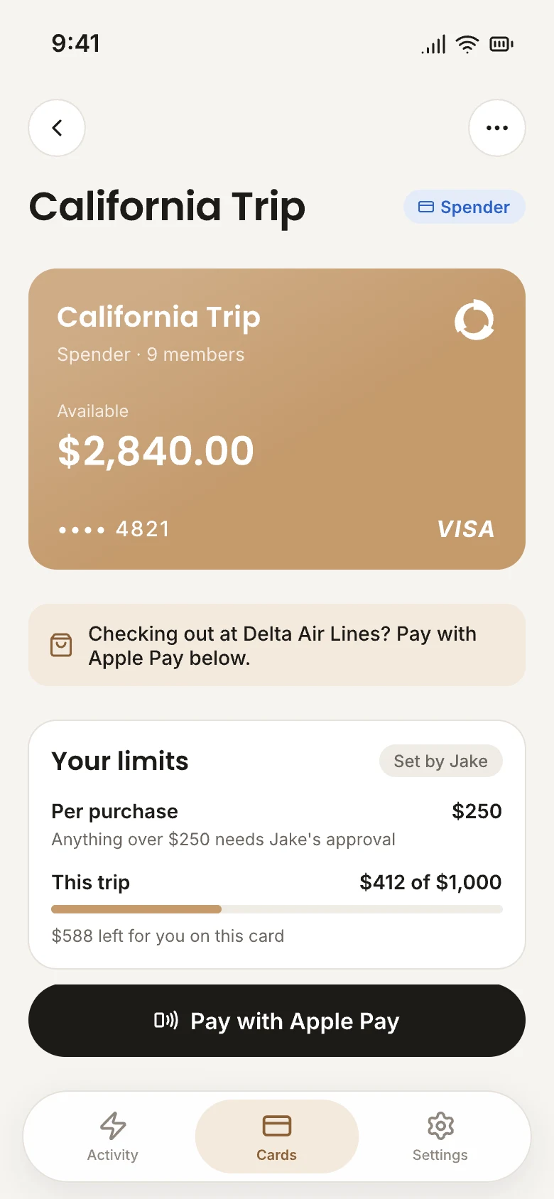 A OneCard card at checkout, with the Spender's limits and a Pay with Apple Pay button